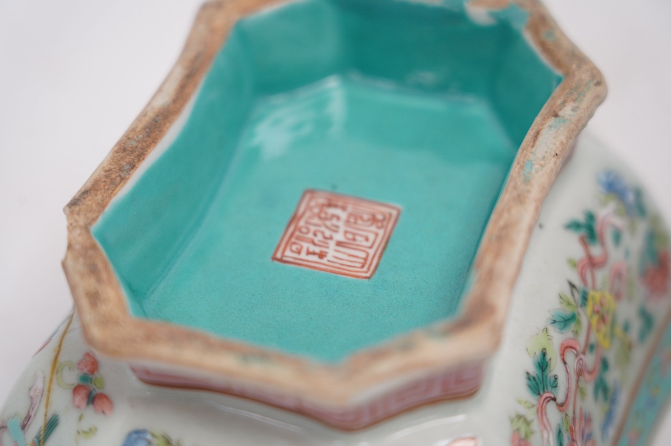 A Chinese famille rose octagonal bowl and another, both Tongzhi mark and period (1862-1874), largest 16cm wide. Condition - rectangular dish is damaged, bowl is fair, chip to the top rim